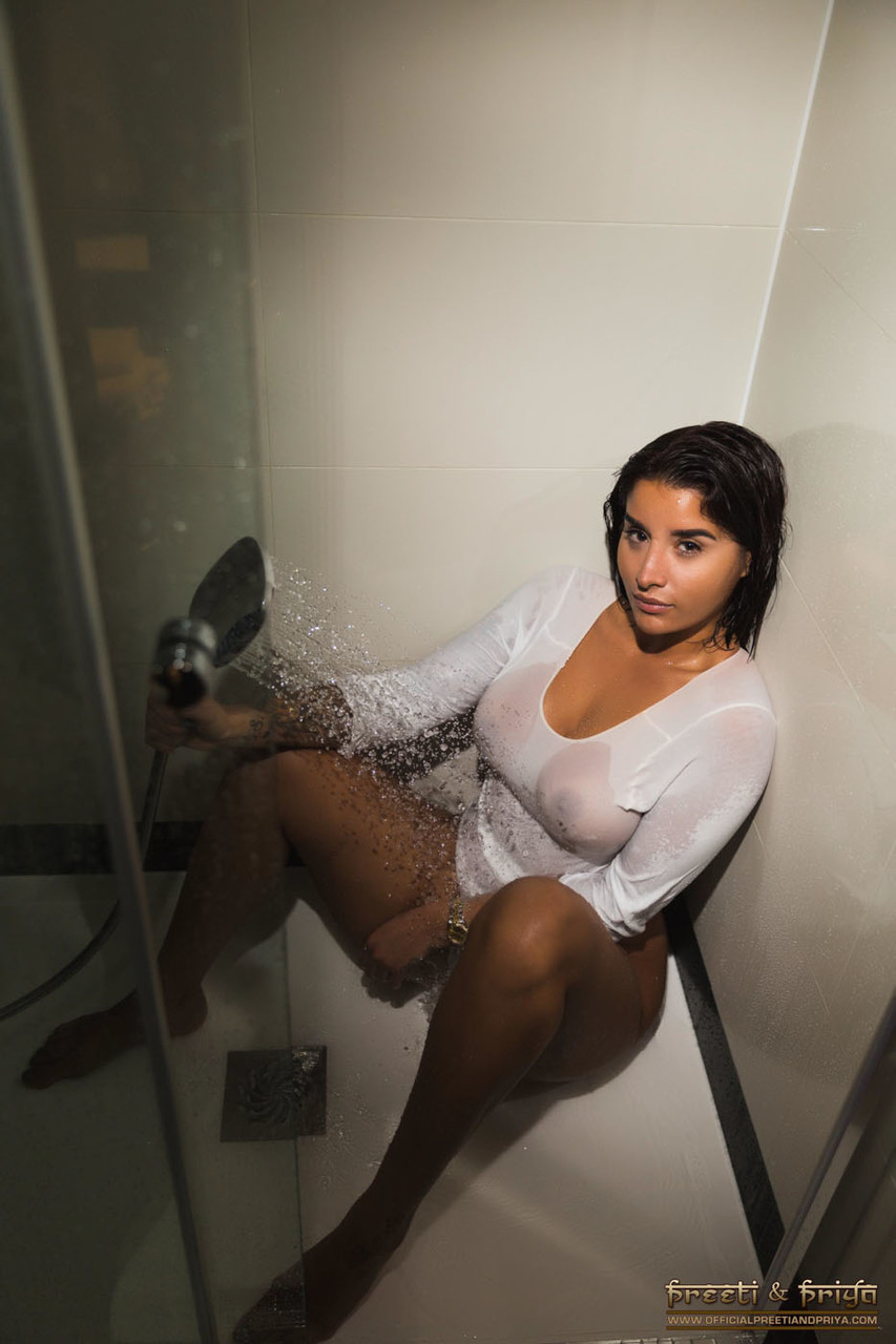 Indian babe Priya is one her big ass while taking a shower in a bodysuit porn photo #423903686
