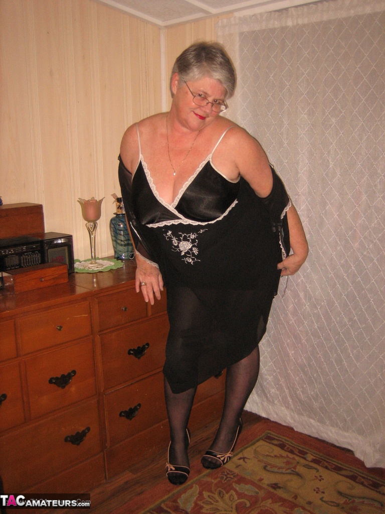 Overweight Nan Girdle Goddess Strips To Her Footwear In Front Of A Dresser