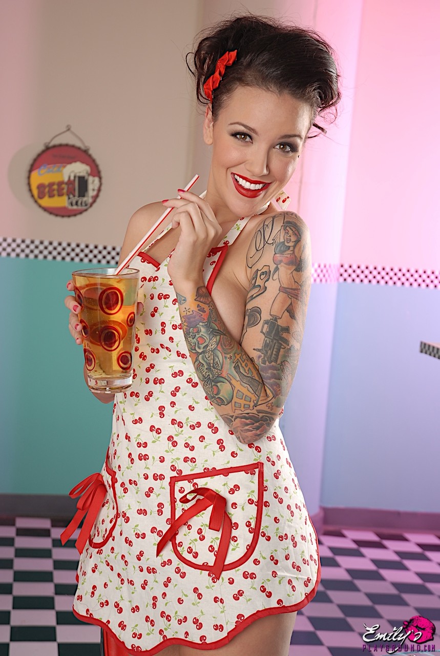 Tattooed waitress Emily Parker doffs an apron to pose totally nude in a diner porn photo #426638573
