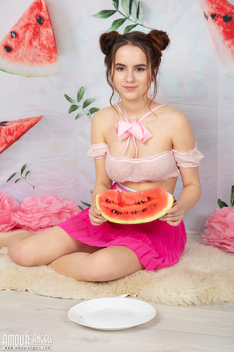 Young looking girl Wendy eats a hunk of watermelon while getting buck naked porn photo #425158780