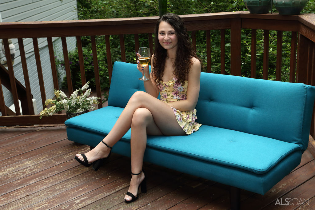 Skinny teen Liz Jordan gets totally naked on a futon out on a backyard deck foto porno #429015503
