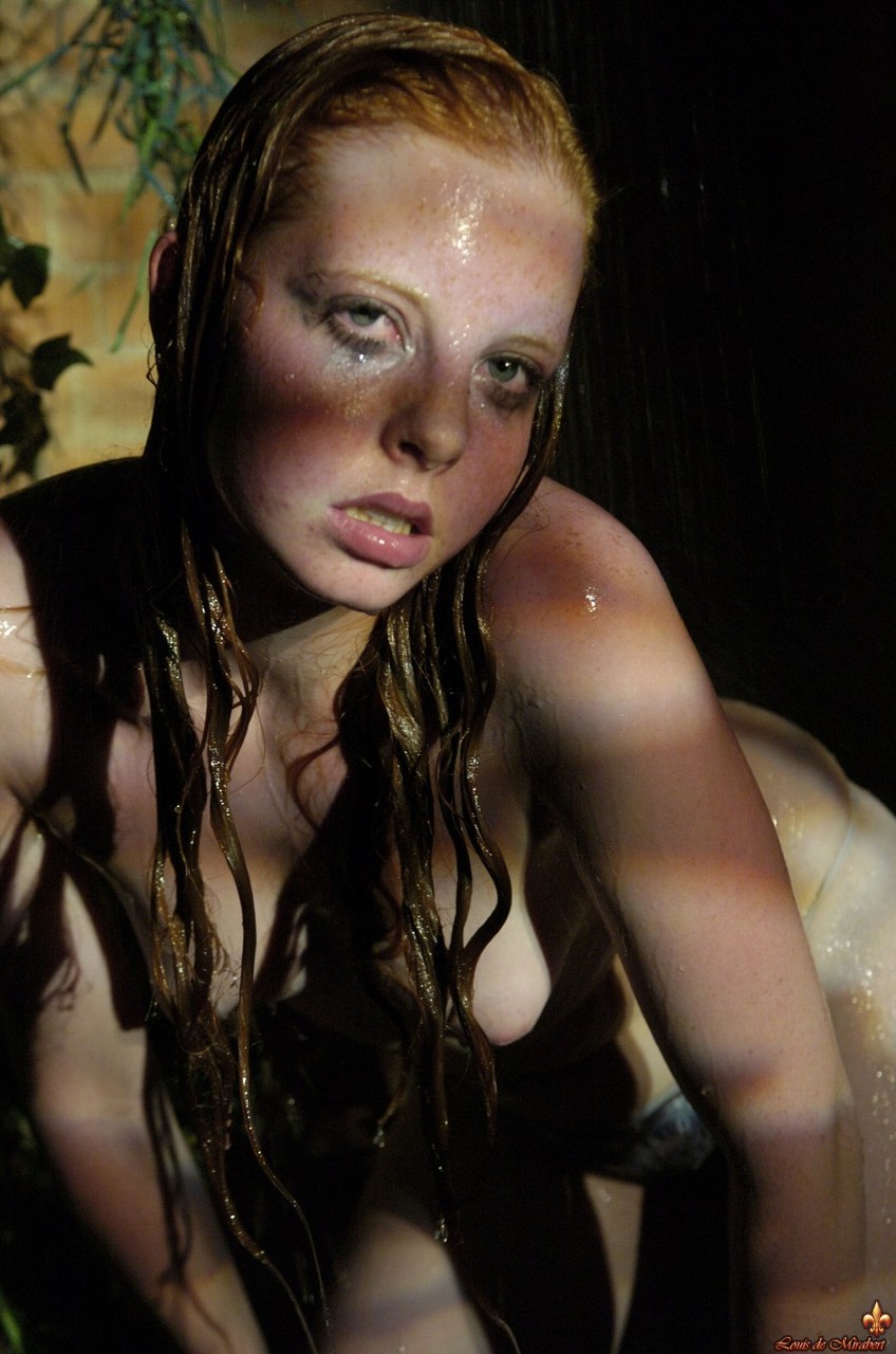 Natural redhead Jeny gets totally naked at night while soaking wet porn photo #426755867