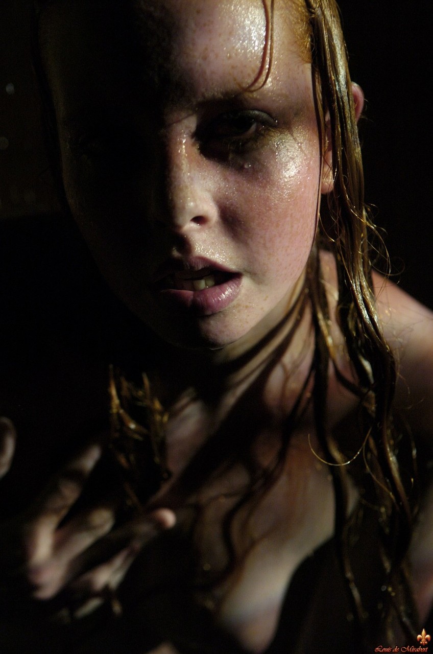 Natural redhead Jeny gets totally naked at night while soaking wet porn photo #426755871