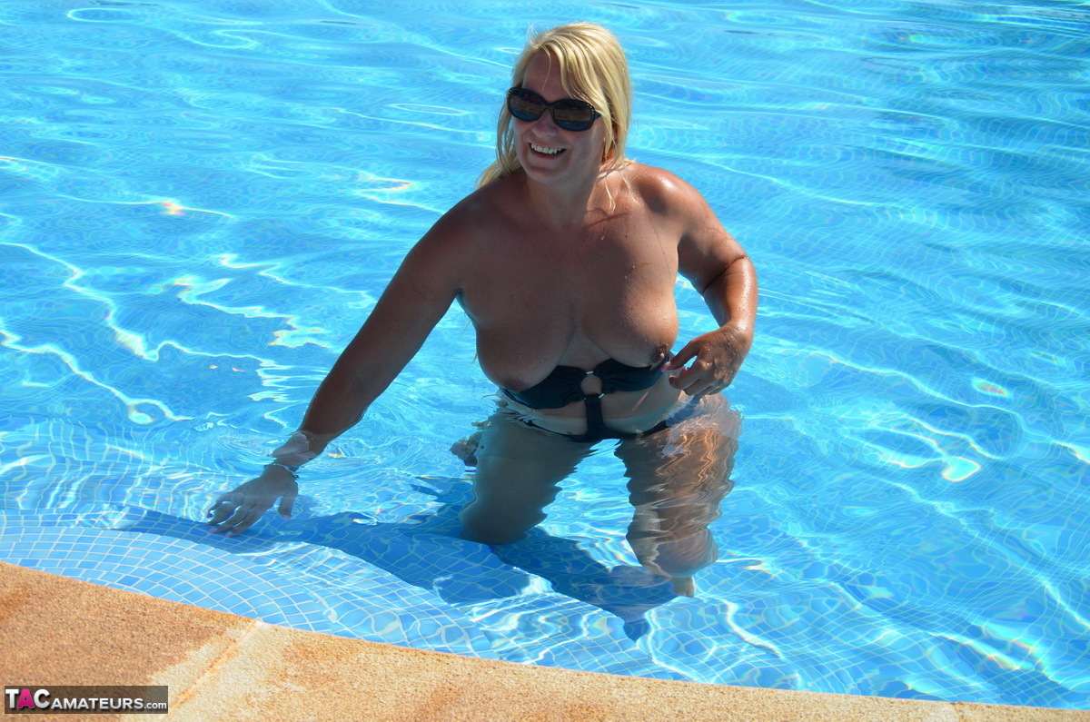 Middle Aged Blonde Sweet Susi Frees Her Tits Pussy From A Swimsuit By A Pool