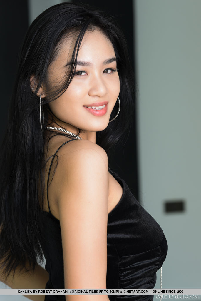 Asian teen Kahlisa sets her hot body free of a black dress during a solo gig porn photo #424193991