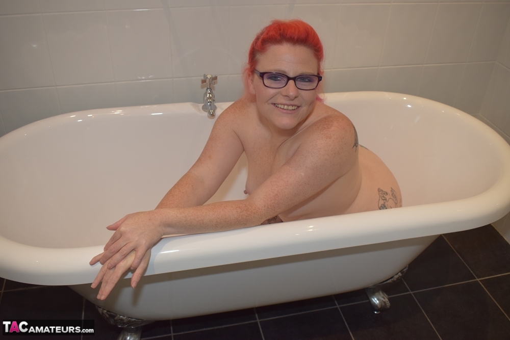 Tattooed redhead Mollie Foxxx models completely naked in a bathroom porno fotky #425953435