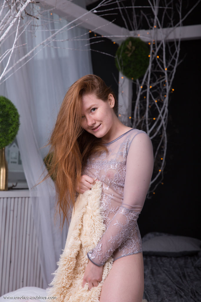 Natural redhead Anika B removes a bodysuit before showcasing her trimmed pussy foto porno #425423039