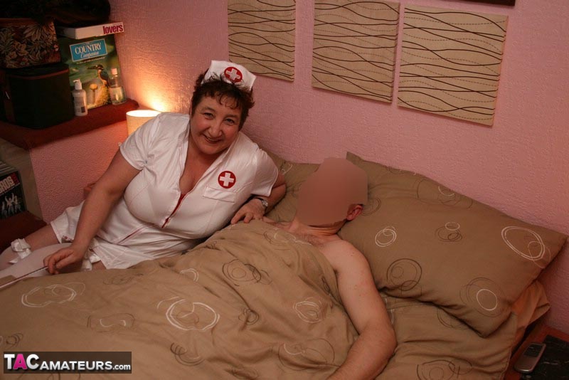 Mature amateur Kinky Carol gets on top of the man while wearing a nurse outfit photo porno #428918007