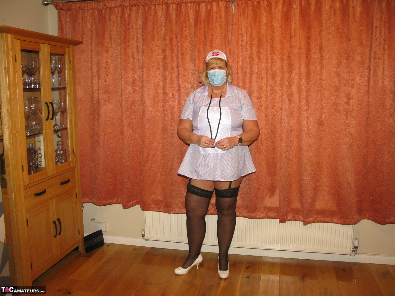 Fat nurse Chrissy Uk removes a surgical mask and uniform to model lingerie foto porno #424682136