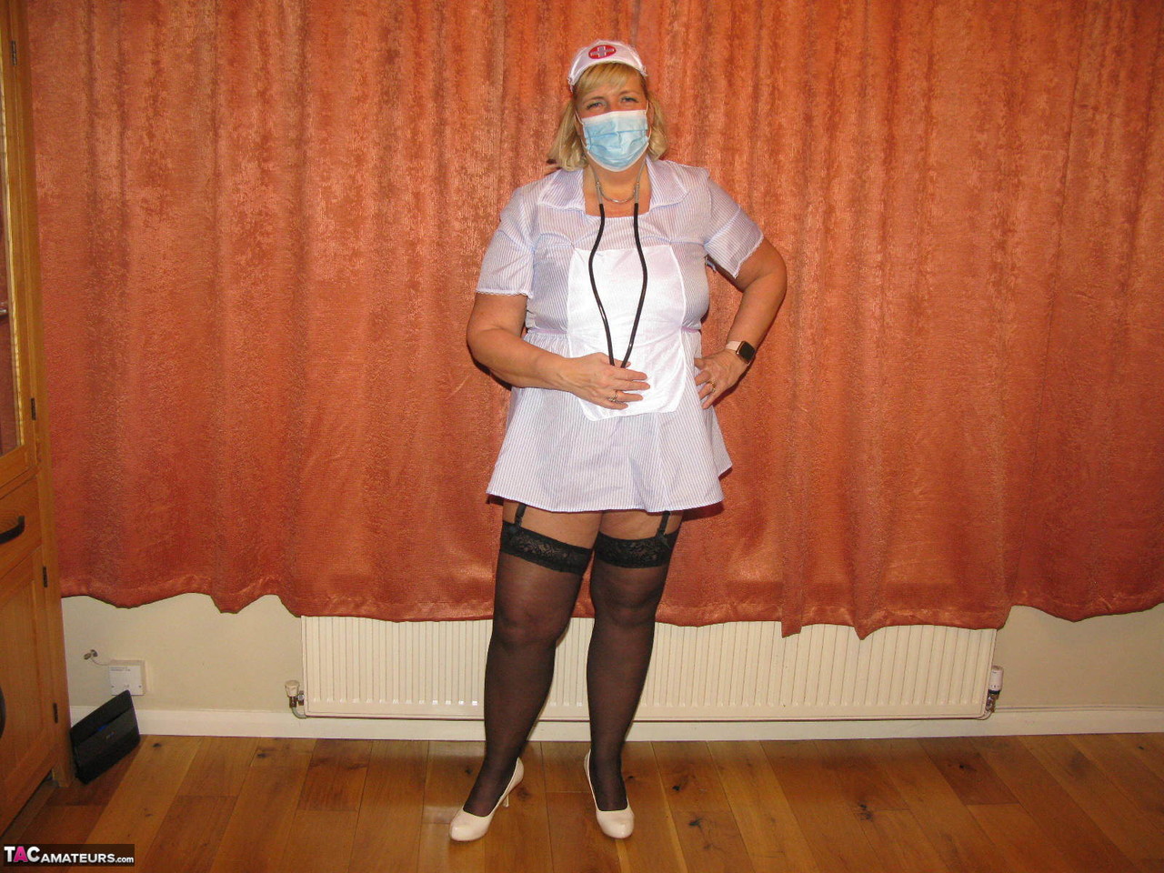Fat nurse Chrissy Uk removes a surgical mask and uniform to model lingerie porn photo #424682137