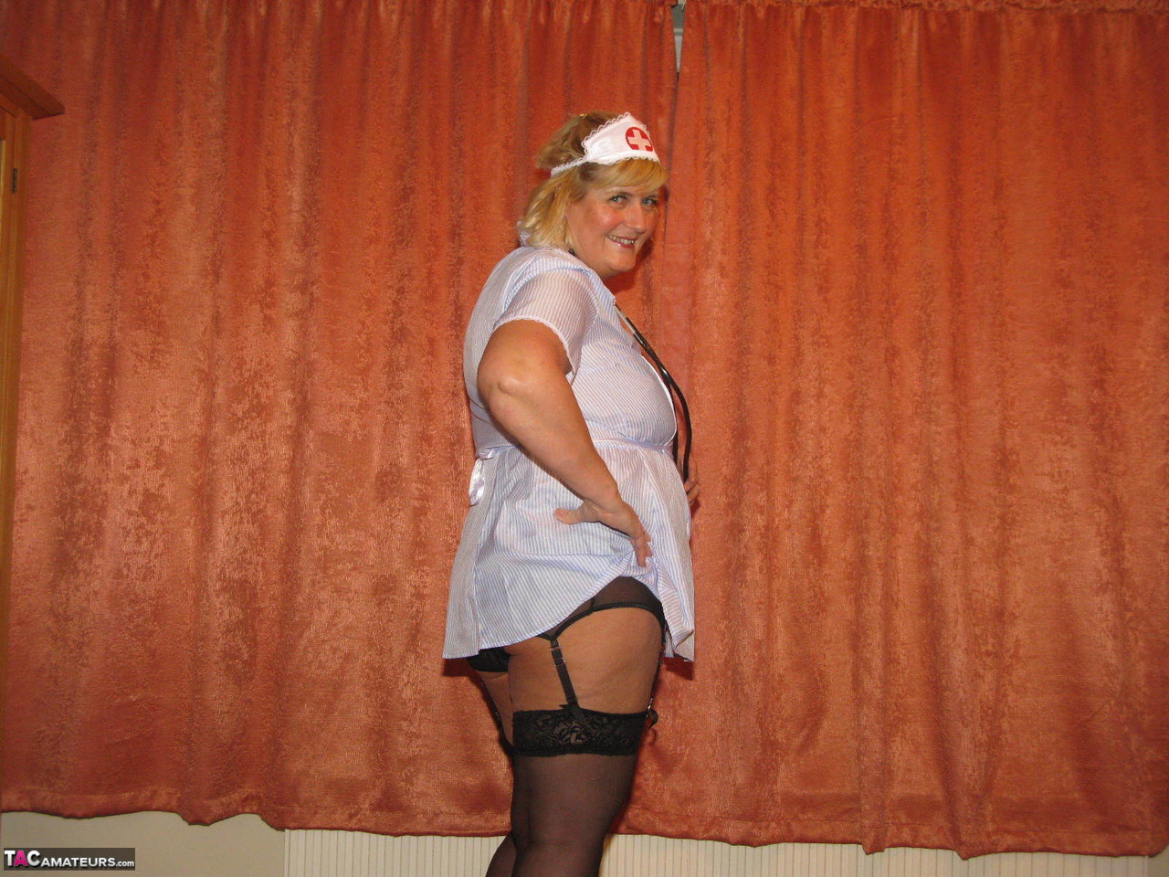 Fat nurse Chrissy Uk removes a surgical mask and uniform to model lingerie foto porno #424682140