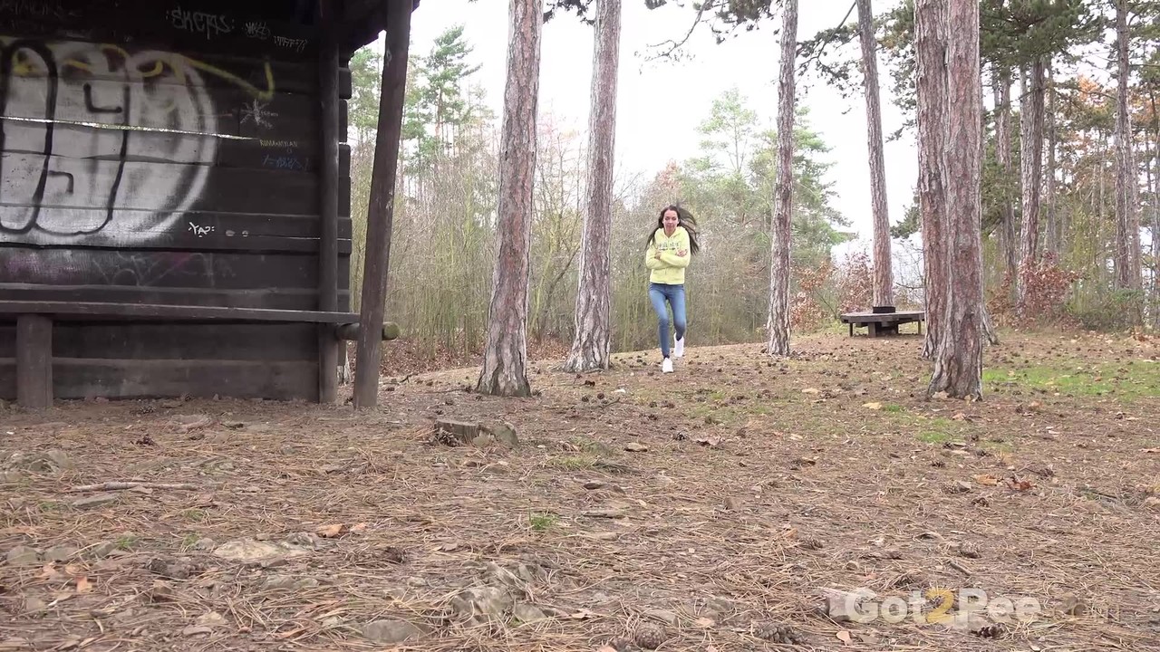 Tiny brunette Mistika squats for a piss next to a warming station in the woods Porno-Foto #425118876
