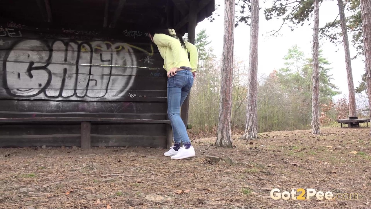 Tiny brunette Mistika squats for a piss next to a warming station in the woods 포르노 사진 #425118877