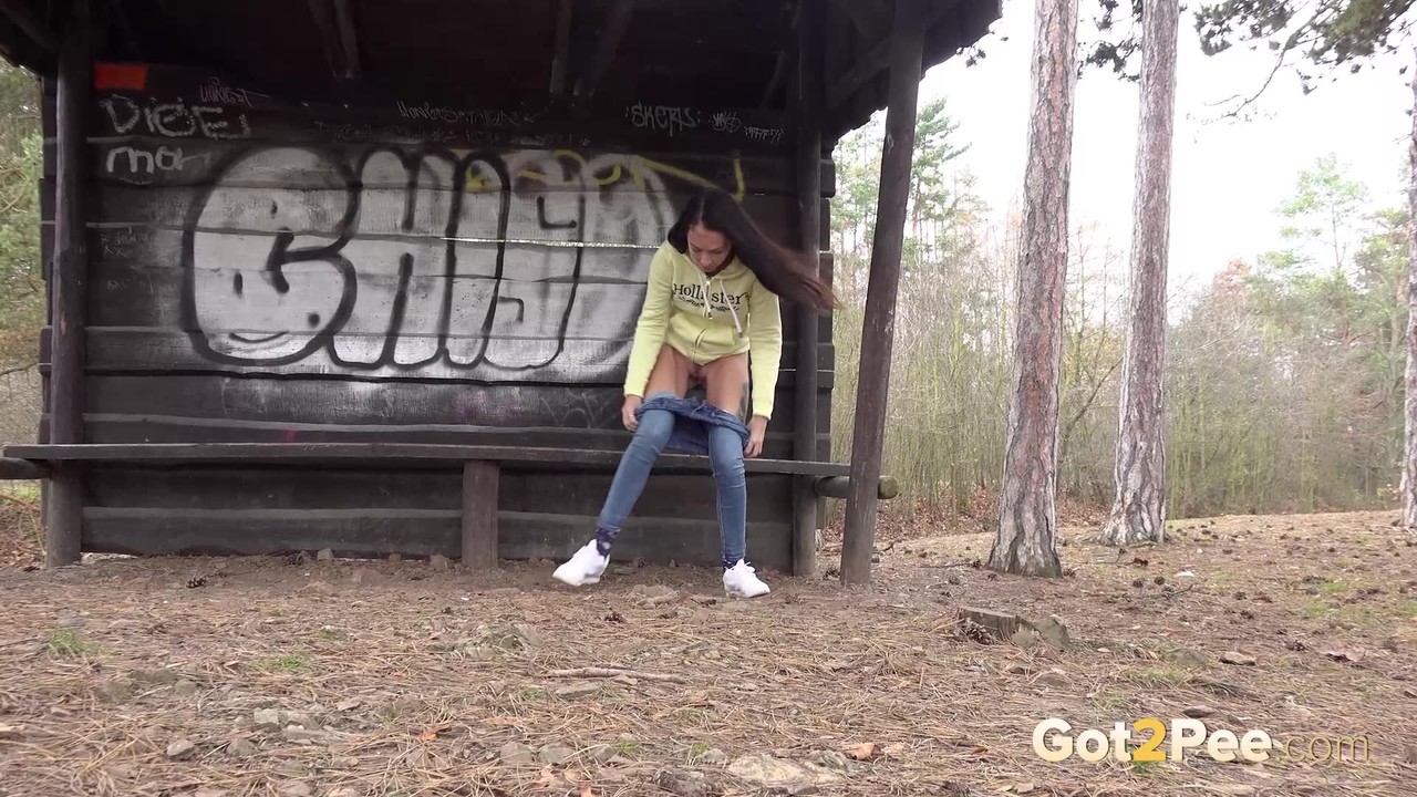 Tiny brunette Mistika squats for a piss next to a warming station in the woods 포르노 사진 #425118878