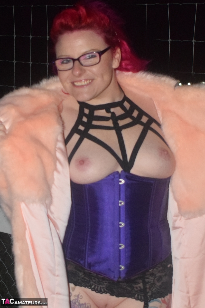 Redheaded amateur Mollie Foxxx flashes at night in a fur coat porn photo #428671561