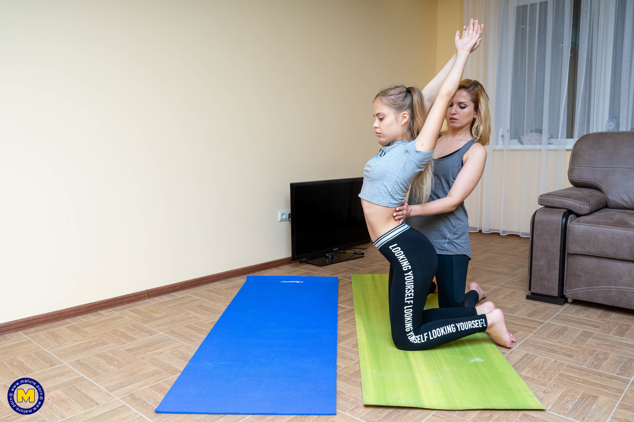 Blonde woman and her young stepdaughter have lesbian sex after doing yoga порно фото #423797280