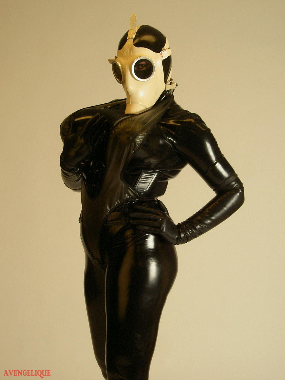 Solo model Darkwing Zero sports a gas mask while modelling latex clothing porn photo #428000387