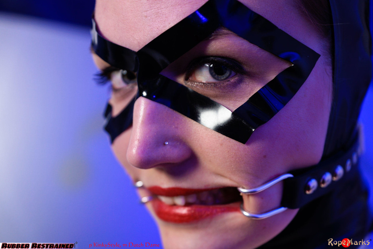 Solo model Dutch Dame sports a mouth spreader while in a rubber costume porno fotky #422716253