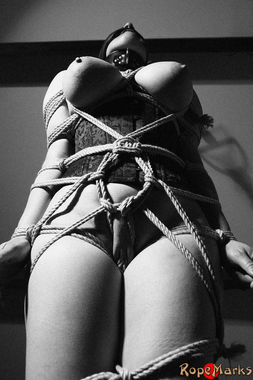 Hooded model Amely is tied and suspended by ropes in an attic setting порно фото #424921113