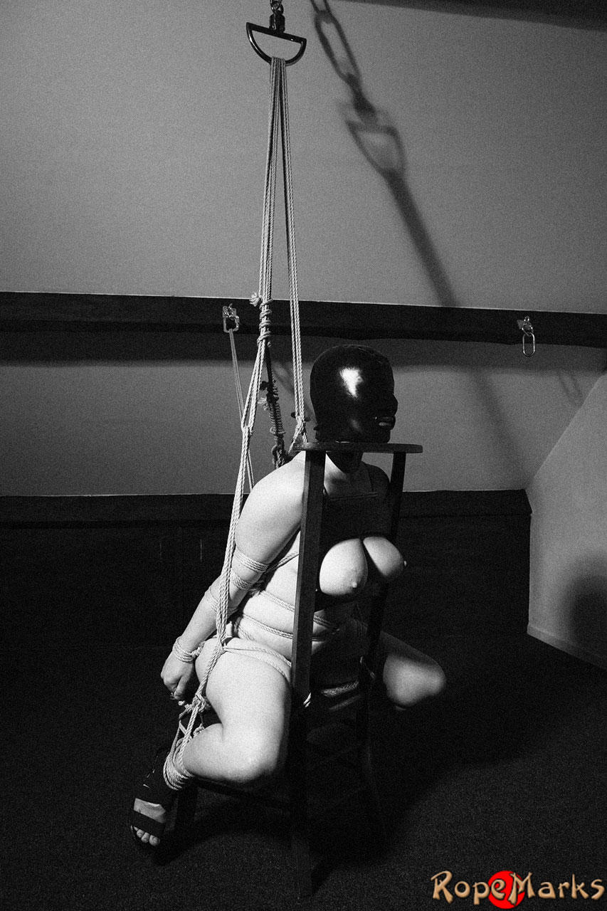 Hooded model Amely is tied and suspended by ropes in an attic setting ポルノ写真 #424921114
