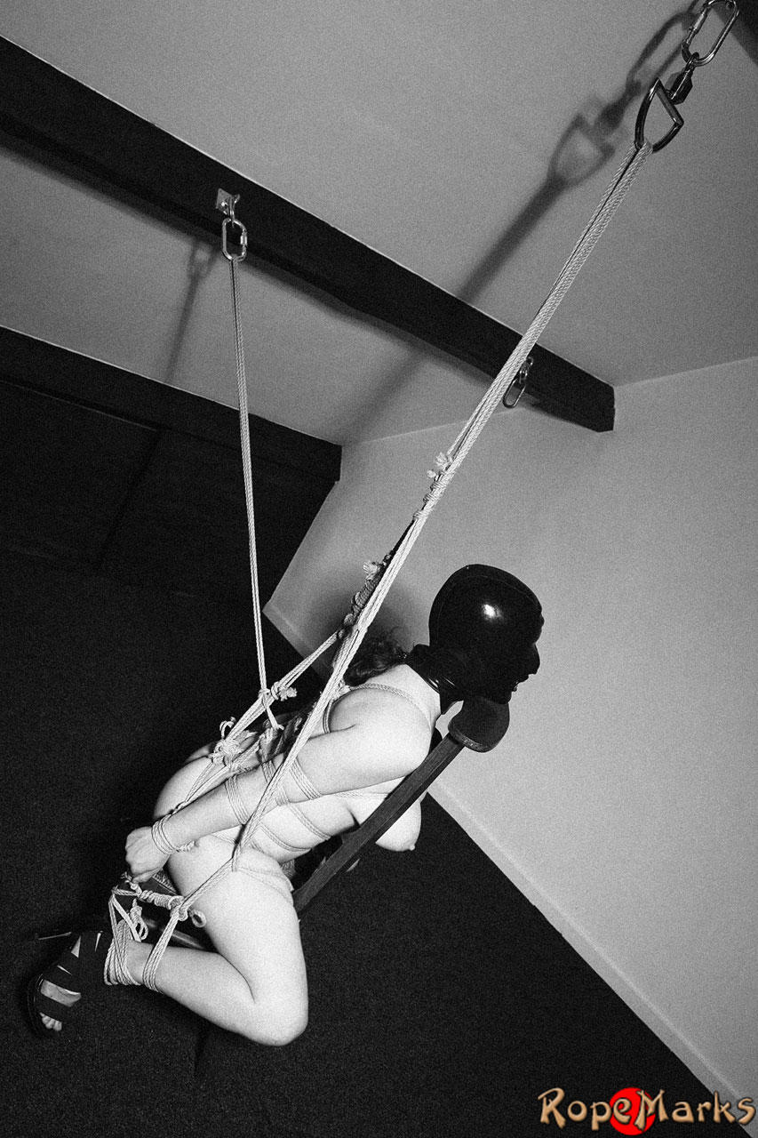Hooded model Amely is tied and suspended by ropes in an attic setting foto porno #424921115