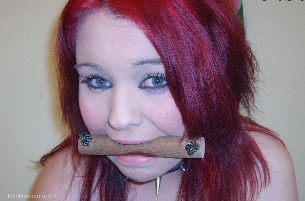 Busty Redhead Sports A Gag And Nipple Clamps While Wrist And Ankle Bound