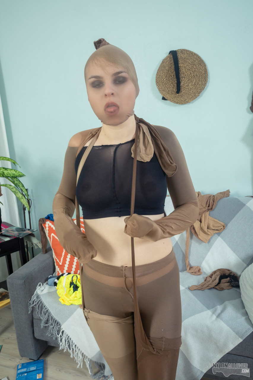 Blonde girl covers herself from head to toe in layers of pantyhose porno fotoğrafı #425323513