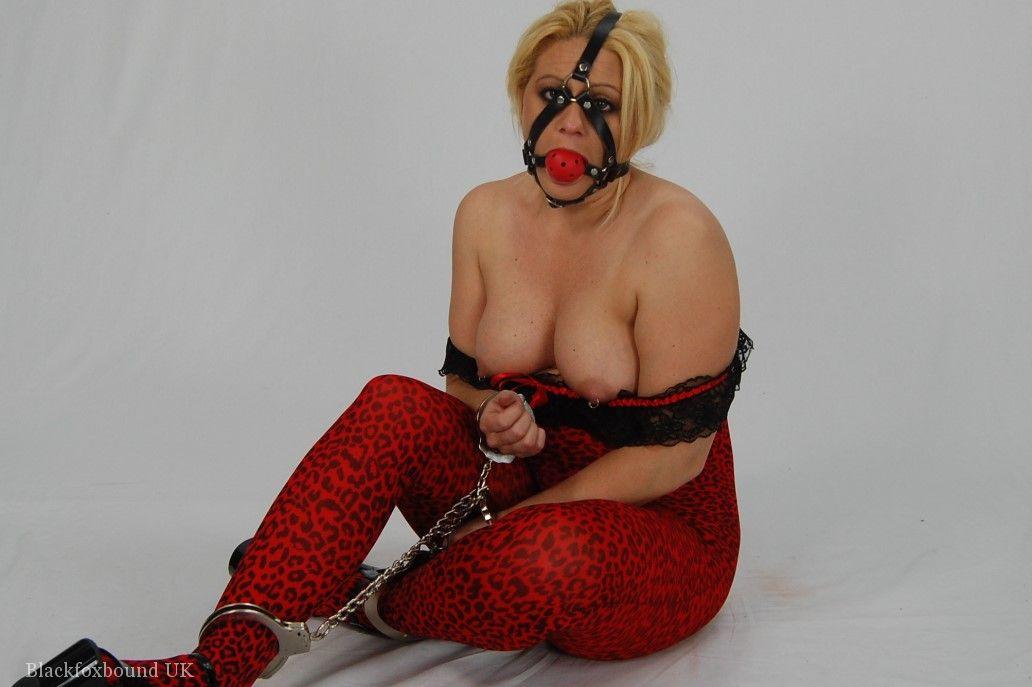 The thick blonde is entangled in chains and subjected to a ball gag until their penis is fully developed before the cock is sucked.