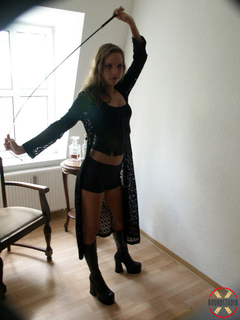 Sexy blonde Sweet Kathy wields a whip while clothed in black boots photo porno #425625915