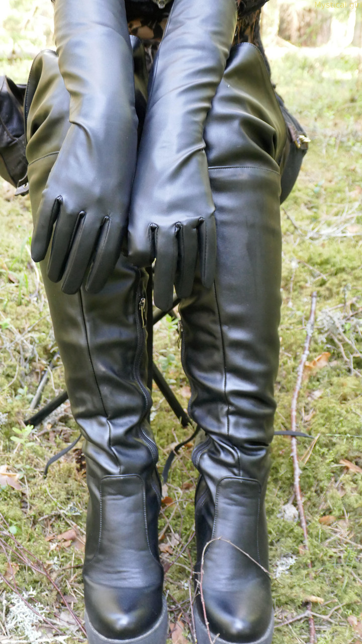 Clothed female wears leather gloves and boots plus shades in the woods photo porno #427310000