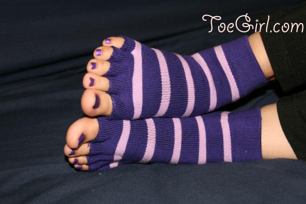 Caucasian female displays her painted toenails in toeless socks porn photo #426657096