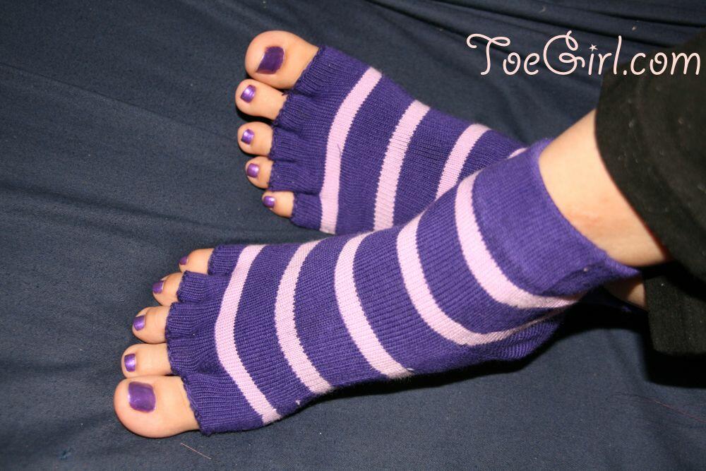 Caucasian female displays her painted toenails in toeless socks foto porno #426657164