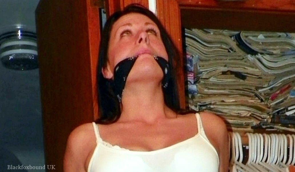 Brunette chick is blindfolded and gagged while her arms & legs are restrained foto porno #422610590