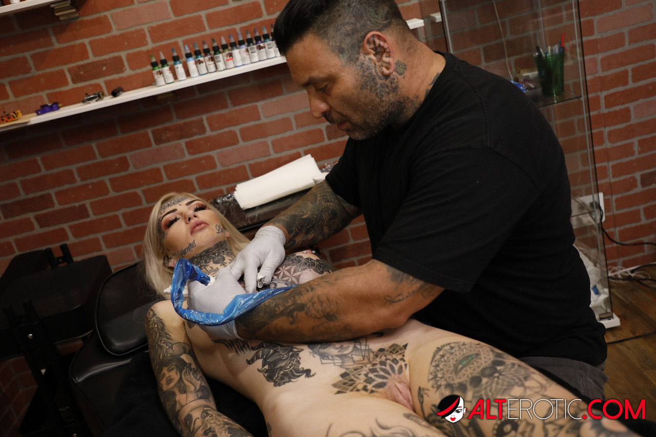 Blonde girl Amber Luke toys her twat after getting a new tattoo in a studio porn photo #424710629