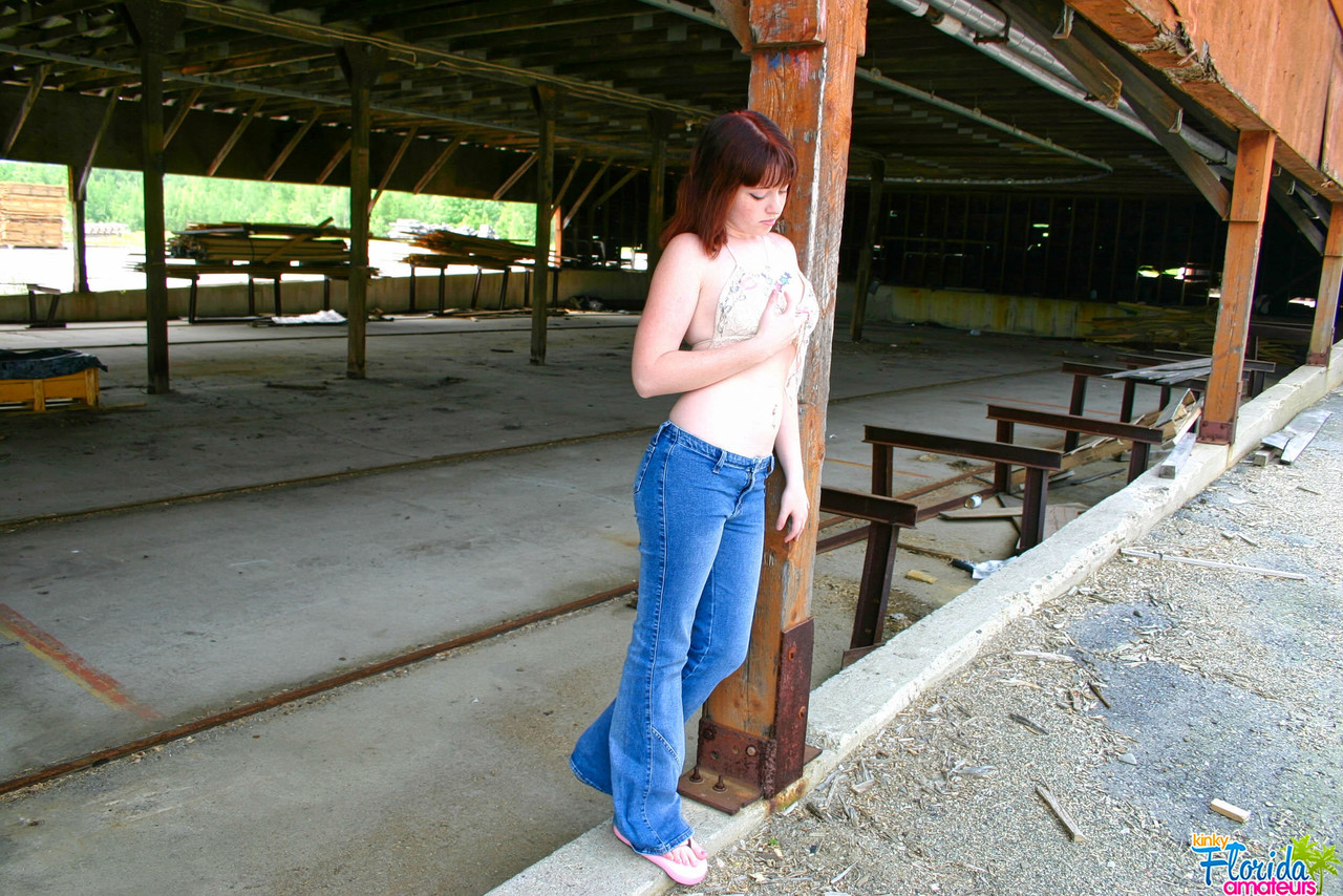 Cute teen with red hair Barbie A uncovers her boobs at a construction site foto porno #429125283