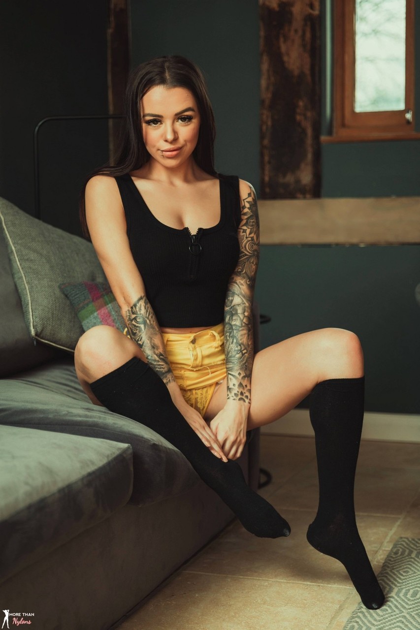 Tattooed model Mia Stryker uncups her nice tits while wearing black knee socks porn photo #426551002