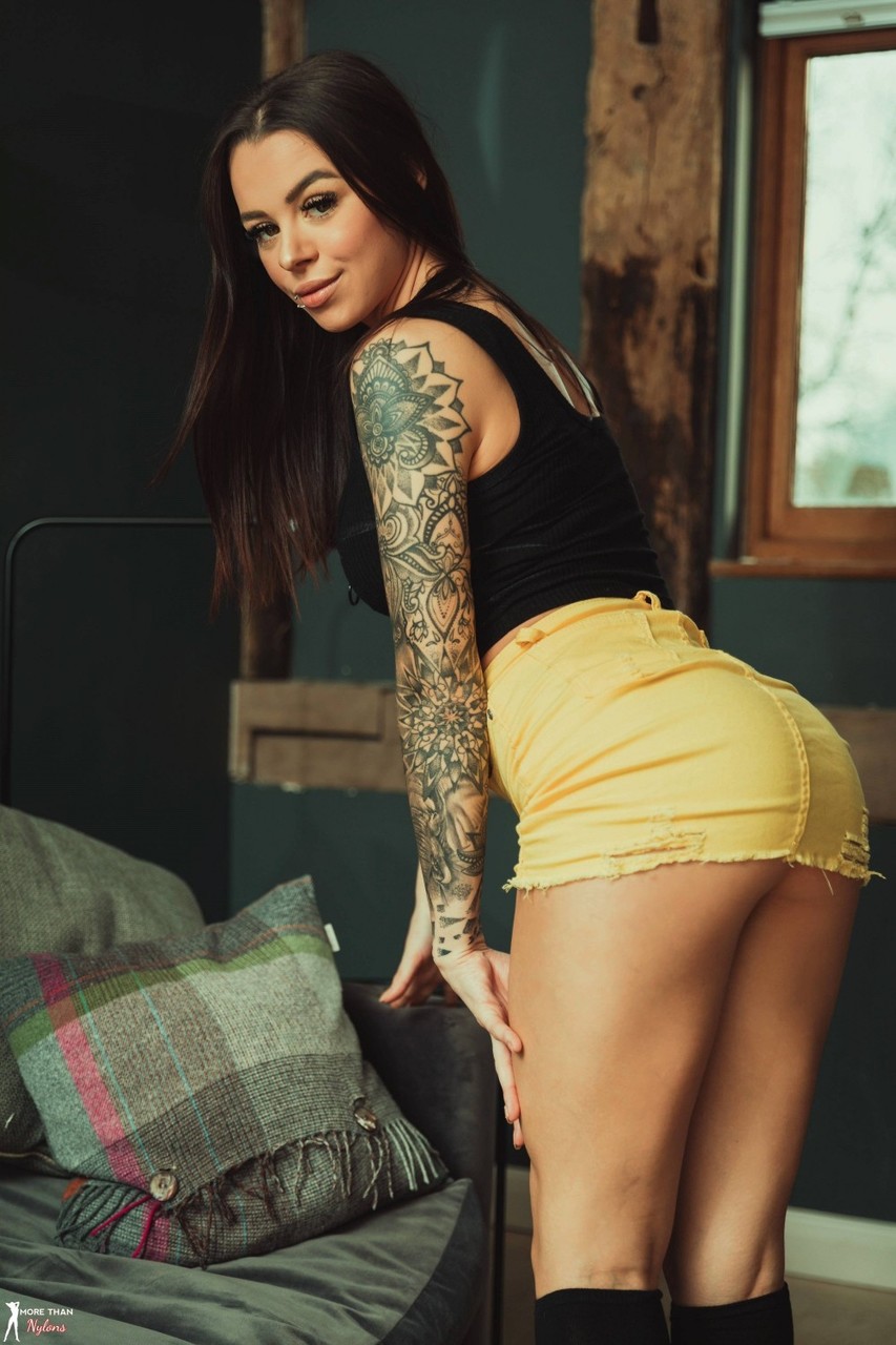 Tattooed model Mia Stryker uncups her nice tits while wearing black knee socks porn photo #426551004