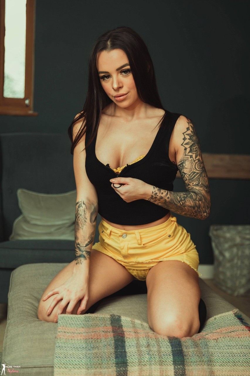 Tattooed model Mia Stryker uncups her nice tits while wearing black knee socks porn photo #426551006