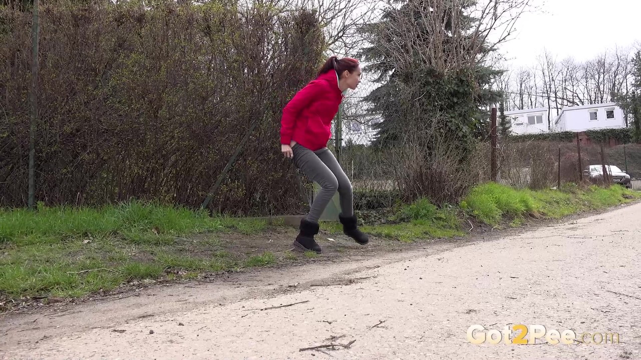 Redheaded girl Mistica squats for a pee beside a dirt road in UGGs porn photo #425536850