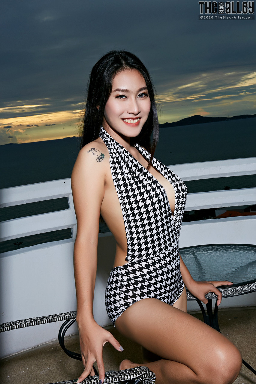 Beautiful Asian girl Linlin gets totally naked on a seaside balcony porn photo #428423688
