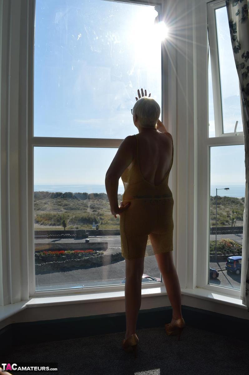 Big titted older woman Barby Slut showcases her bald twat in front of a window porno foto #424802952 | TAC Amateurs Pics, Barby Slut, Mature, mobiele porno