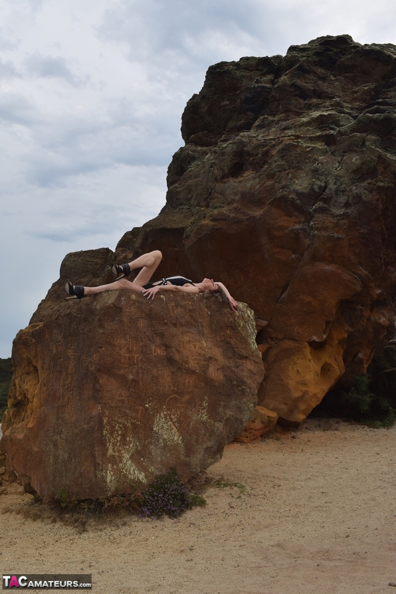 Amateur model gets naked in high-heeled footwear on iron ladened rocks ポルノ写真 #428560054