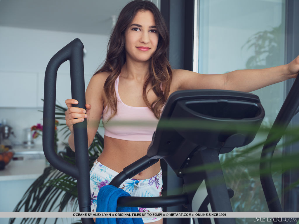 Athletic teen Oceane gets completely naked after a workout on a machine foto porno #429011701