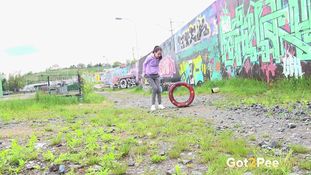 Solo girl Mistica pulls down her jeans to take a piss on a gravelly footpath ポルノ写真 #426400370