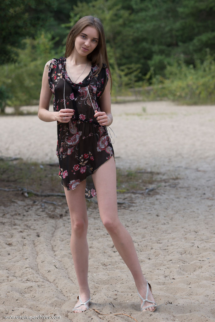 Skinny teen Vialika takes off her dress to stand totally naked on a sand patch 色情照片 #426682075