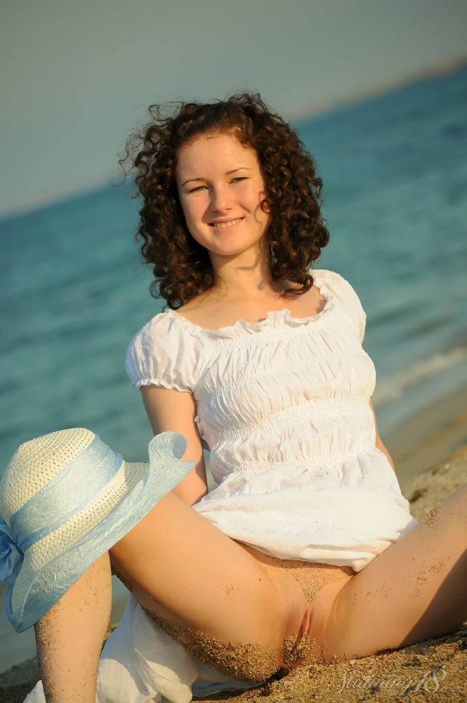 Charming 18-year-old Christina F gets completely naked on a sandy beach porno fotoğrafı #429015179