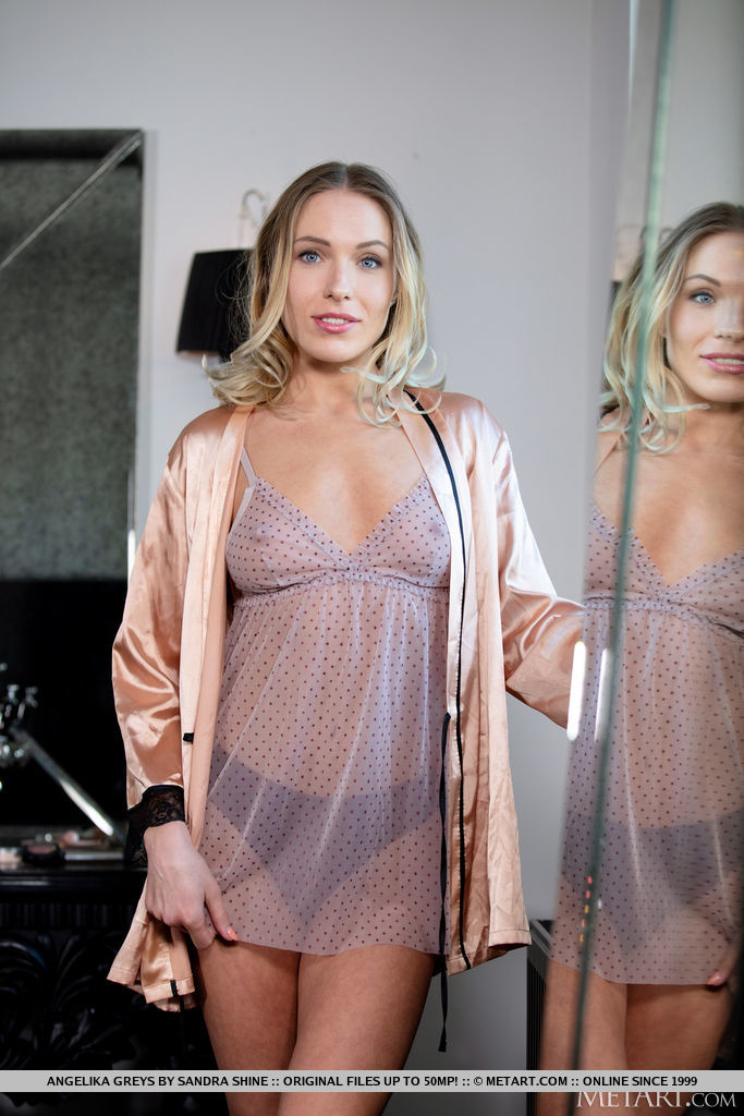 Young blonde Angelika Greys removes a robe and her lingerie to get naked foto porno #423784536