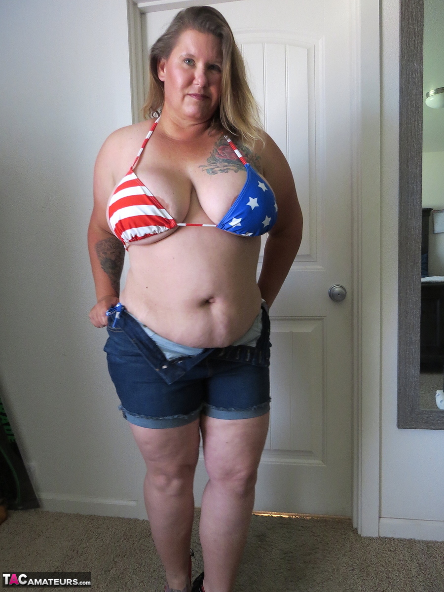 Fat amateur Busty Kris Ann licks a nipple after removing her bikini porn photo #424269663