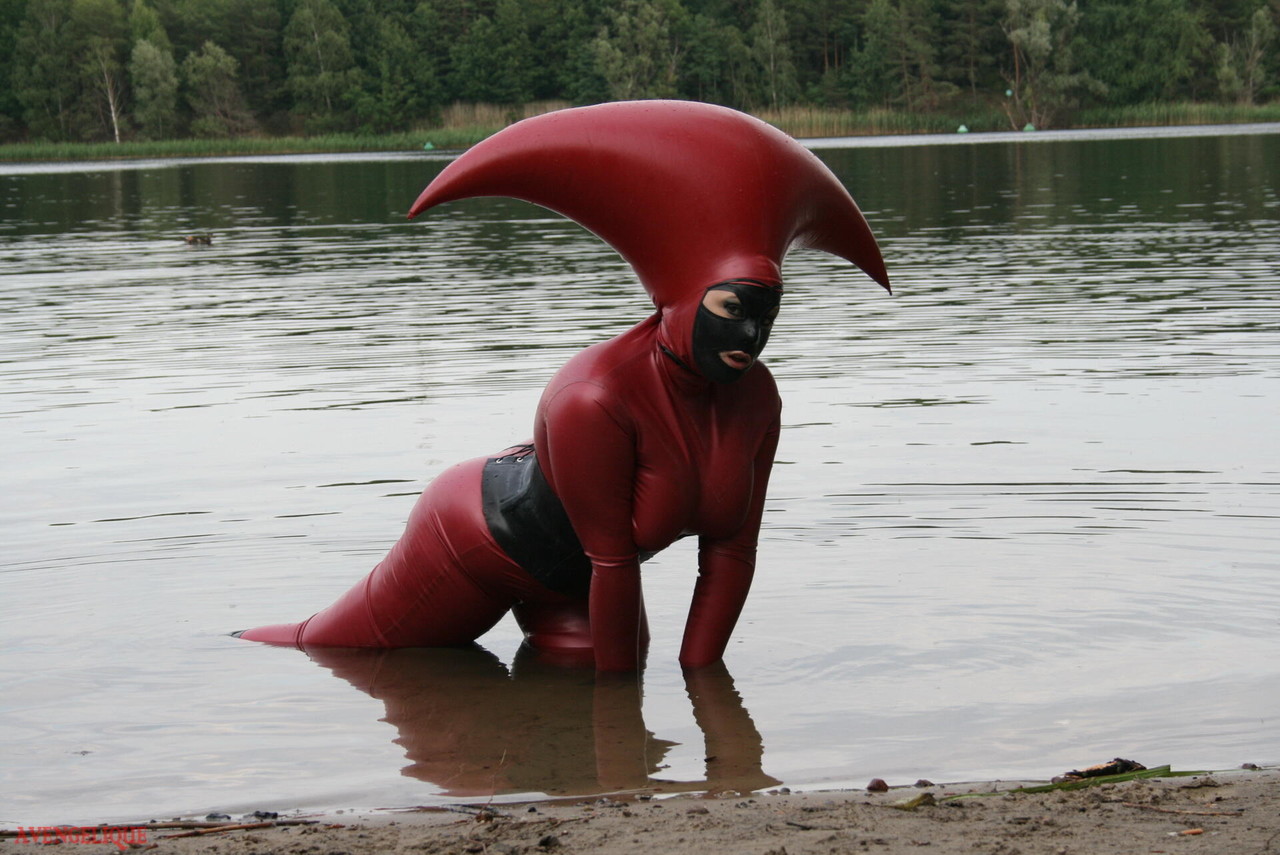 Fetish model Avengelique wades into a body of water in a rubber costume porno foto #427876408 | Rubber Tits Pics, Avengelique, Latex, mobiele porno