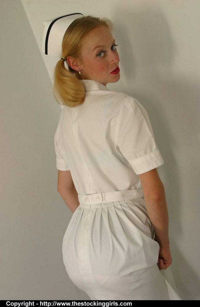 Blonde nurse sports red lips while getting naked in backseam nylons porno foto #425531297